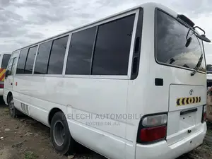 Toyota Coaster 2011 White