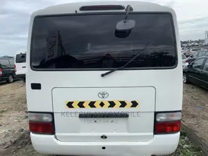 Toyota Coaster 2011 White