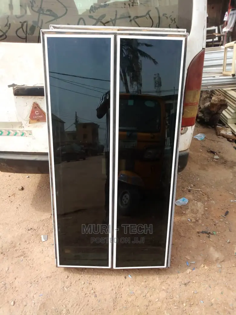 White Casement Framless Window With Black Glass