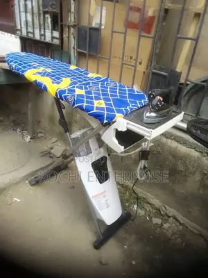 Photo - Industrial Iron Iron With Table Finishing Table