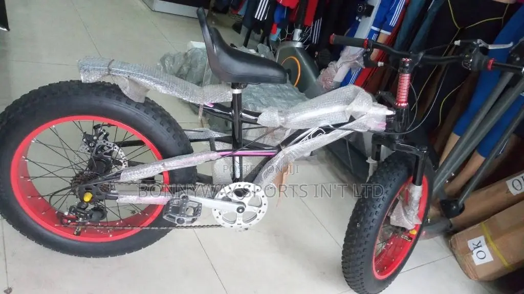 Children Big Tires Riding Bicycle