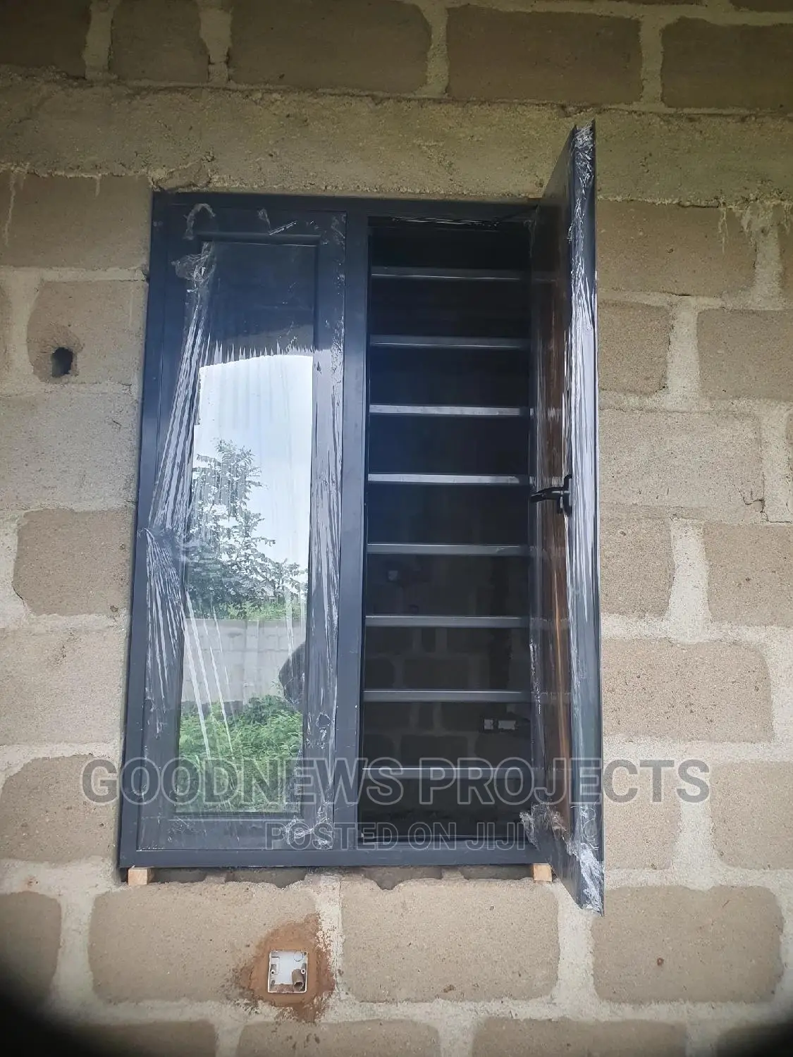 Gray And Reflective Casement Window Only