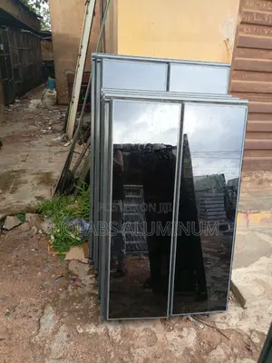 Transom Windows With Blue Glass and Buglary