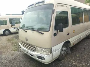 Toyota Coaster 2013 Gold