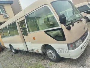 Toyota Coaster 2013 Gold