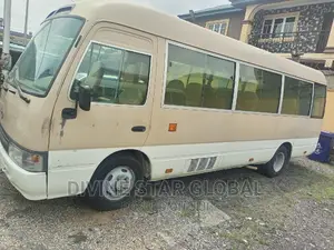Toyota Coaster 2012 Gold