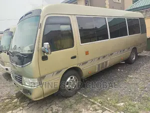Toyota Coaster 2012 Gold