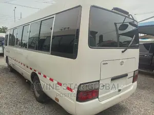Toyota Coaster 2015 Gold