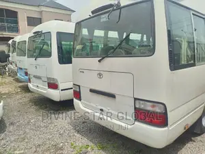 Toyota Coaster 2015 Gold