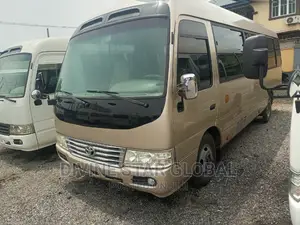 Toyota Coaster 2015 Gold