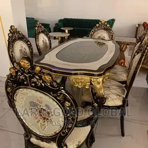 Imported Royal Black Dining Set That Comes With 6 Chairs