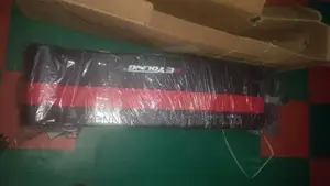 The Young Situp Bench With a Pair of Dumbells Nd Rope