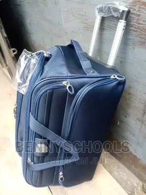 Medium Navy Blue Star Express Traveling Bags With Trolleys