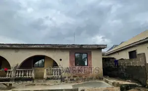 Upto Half Plot of Land at Assese.