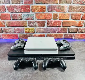 Super Neat UK Used Ps4 Slim 500gb With Controllers