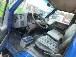 Toyota Dyna 300 With Red Bucket