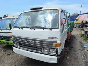 Toyota Dyna 300 With Red N Light Green Bucket