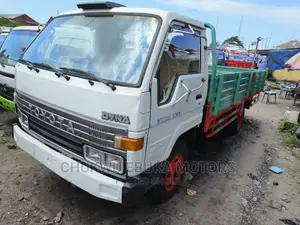 Toyota Dyna 300 With Red N Light Green Bucket