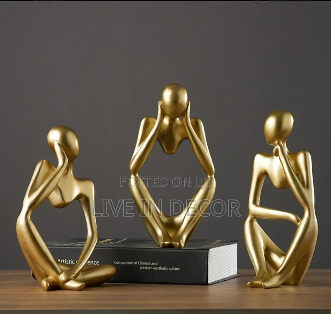 Gold Thinker Statues