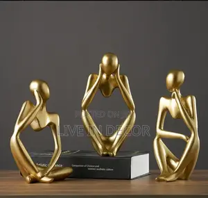 Gold Thinker Statues