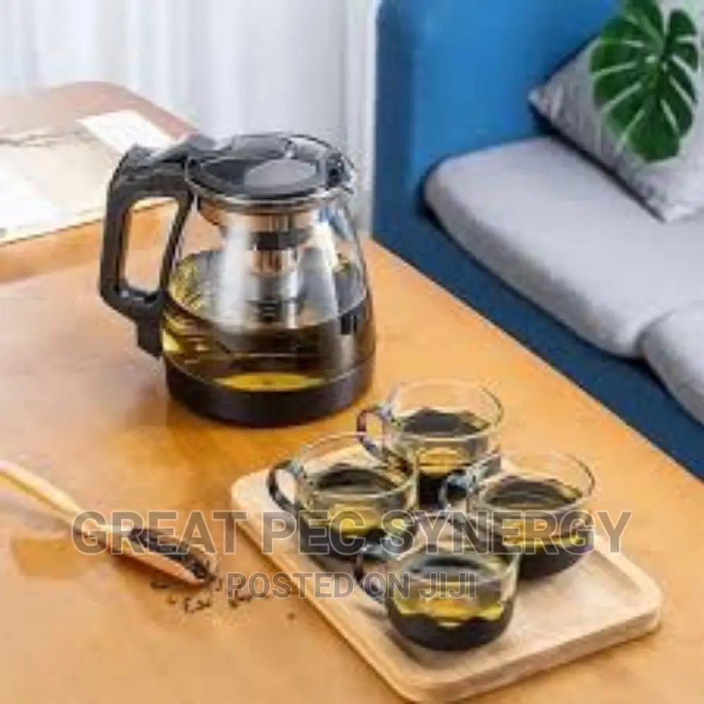 Tea Pot and 4 Glass Cups