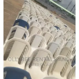 Large Quantity White Armless Chairs Available For Rent.