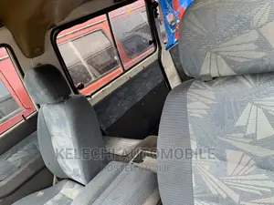 Mitsubishi L300 2004 White