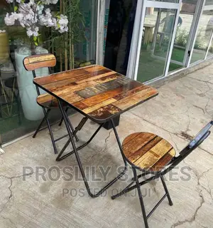 Foldable Table and 2 Foldable Chairs .