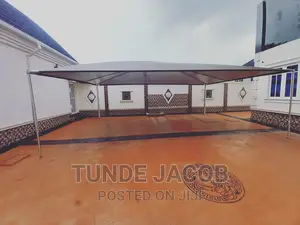Carport Made With Galvanized Pipes and Waterproof Net