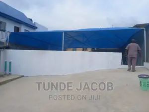 Carport Made With Galvanized Pipes and Waterproof Net