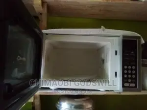 Glass Face Morphy Richard Microwave and Grill Machine