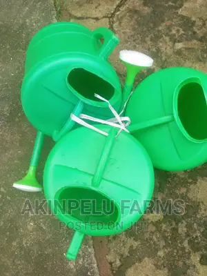 Plastic Watering Can.