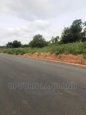 63 Acres Beside the Common Wealth Estate C of O. In IDO
