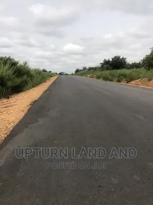 63 Acres Beside the Common Wealth Estate C of O. In IDO