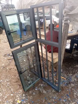 Double Panel Aluminum Casement Window With Inner Burglary.