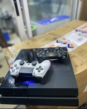 Playstation 4 + Extra Controller and Full Accessories Intact