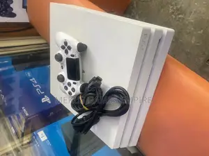 PS4 PRO + 9 Installed Games Both FIFA24,MK,GTA5, More