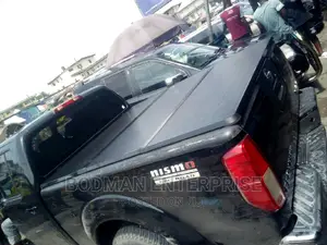 Fiber Folding Boot Cover for Nissan Frontier =