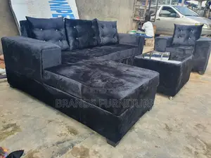 Photo - Beautiful Black Lshap Single With Center Table