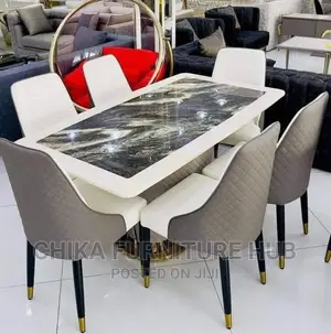 Quality Marble Dinning by 6 Chairs