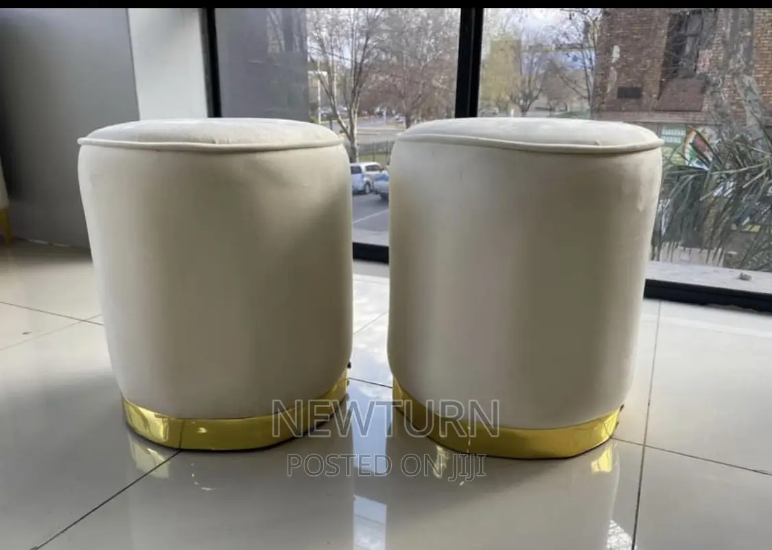 Two Singles Poufs Stools.