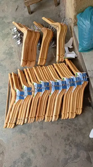 Pairs Of Clip And Ordinary Wooden Hangers