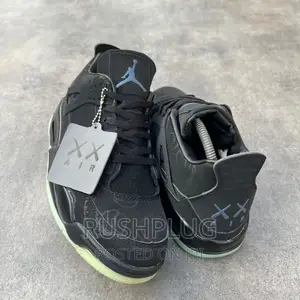 Air Jordan 4 All Black “Kaws”(Dark Glow)