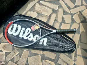 Wilson Tennis Racket Orange And Silver