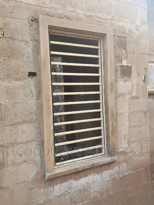Cream Frameless Window With Burglary
