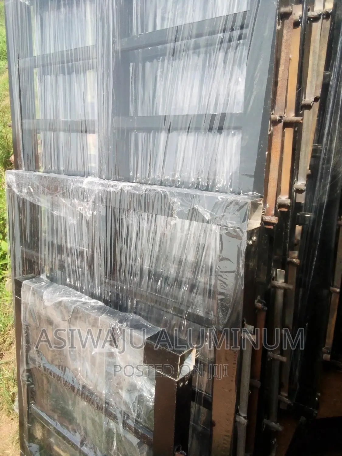Black Transome Frameless Windows