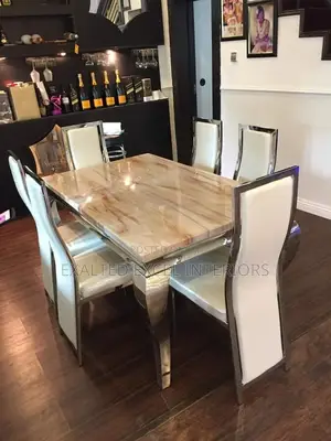 Six Seaters Marble Dinning Set.