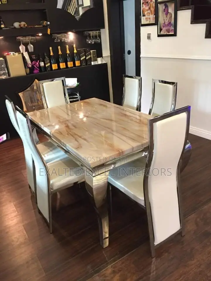 Six Seaters Marble Dinning Set.