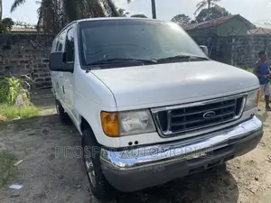 Photo - Ford E350 2006 Yellow