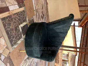 Sleek Arm Chair Up for Grab